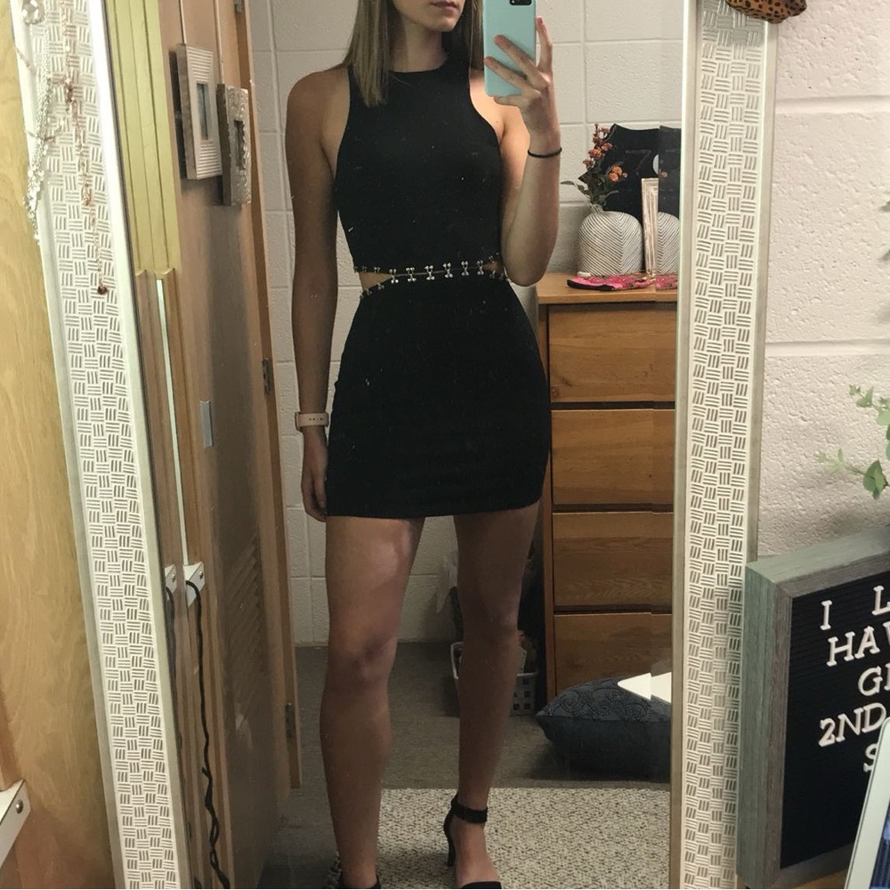 by the way. Black Sleeveless Cutout Mini Dress